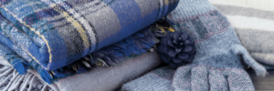 close up stock photo of winter scarves and gloves