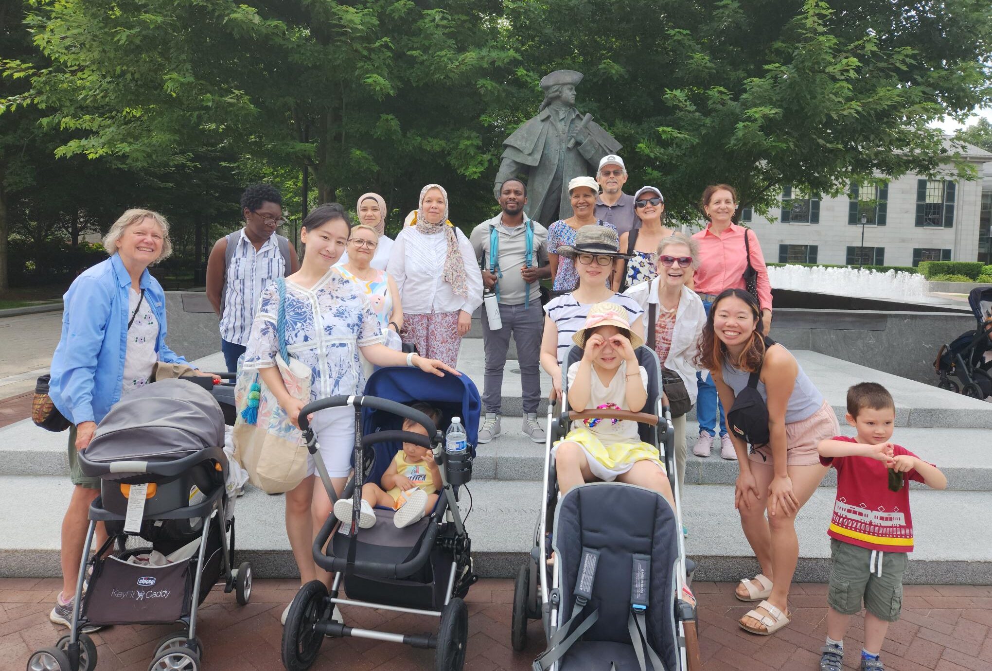 outdoor photo of walk and talk attendees and volunteers in front of the Paul Revere statue in Quincy Center
